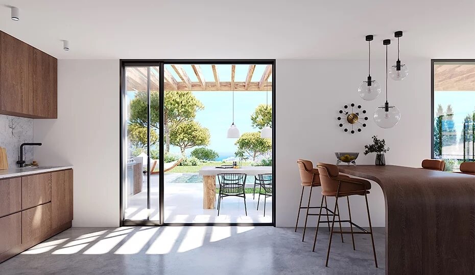 Baie vitrée coulissante aluminium ouvrant sur une terrasse